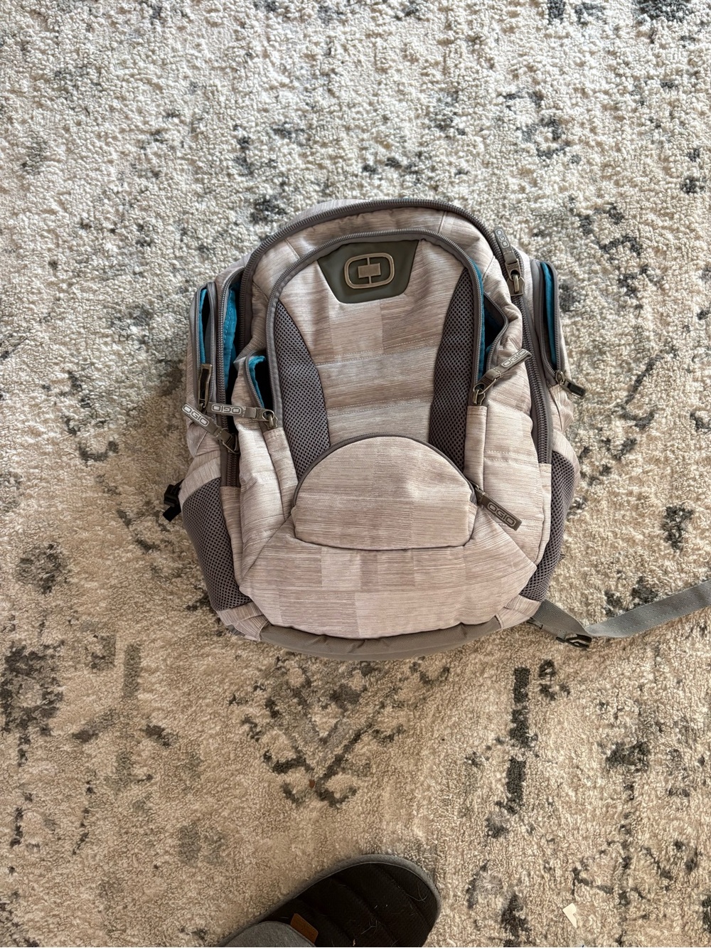 OGIO Gray Backpack with Blue Interior Accents